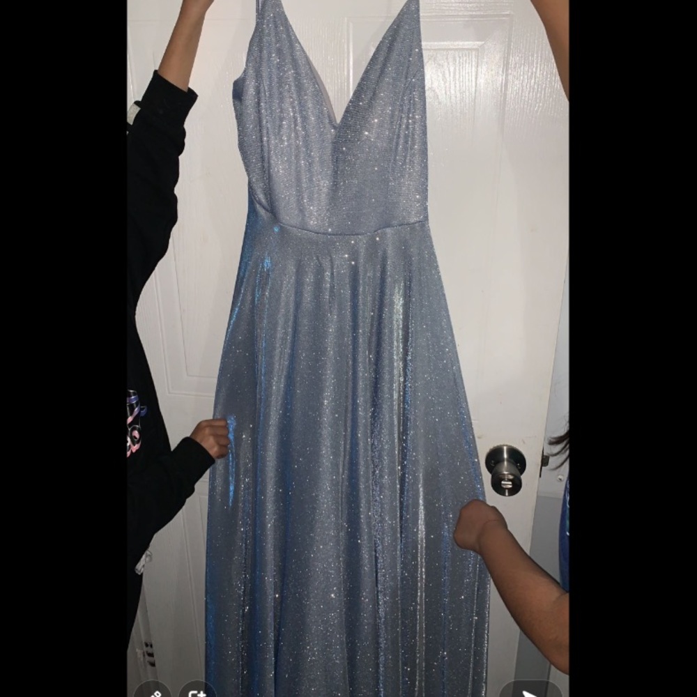 I am selling a prom ball gown from Windsor.